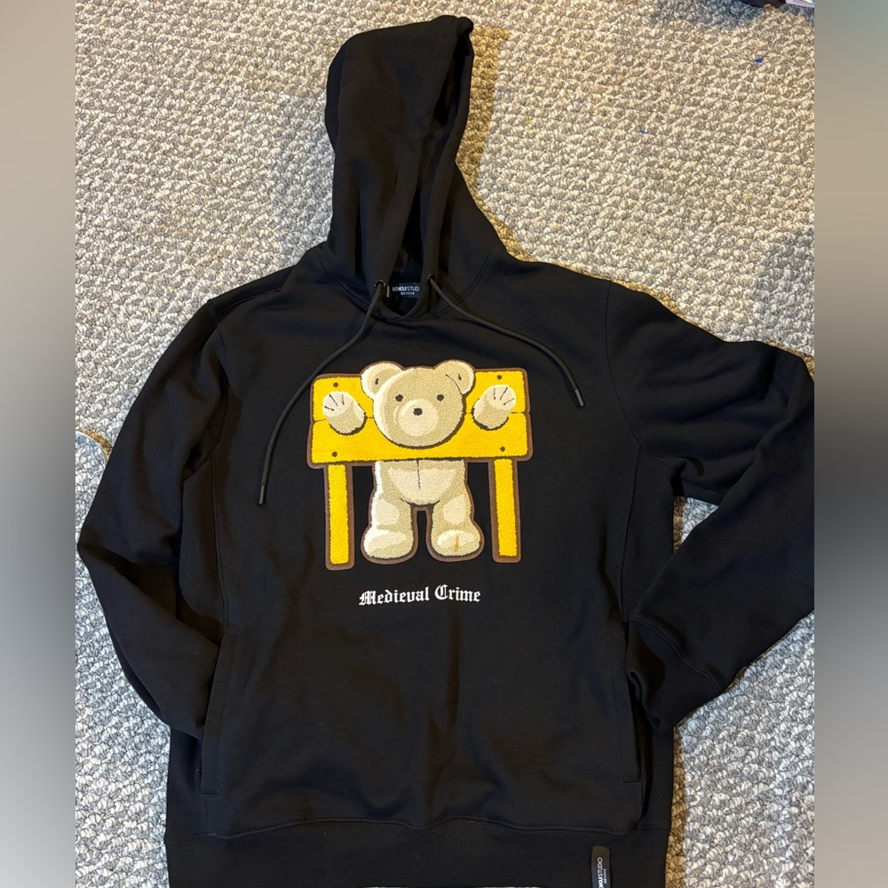 Roku Studio "Medieval Crime" hoodie 
Black with Bear graphic